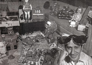 Marvin Glass with oversized glasses and toys